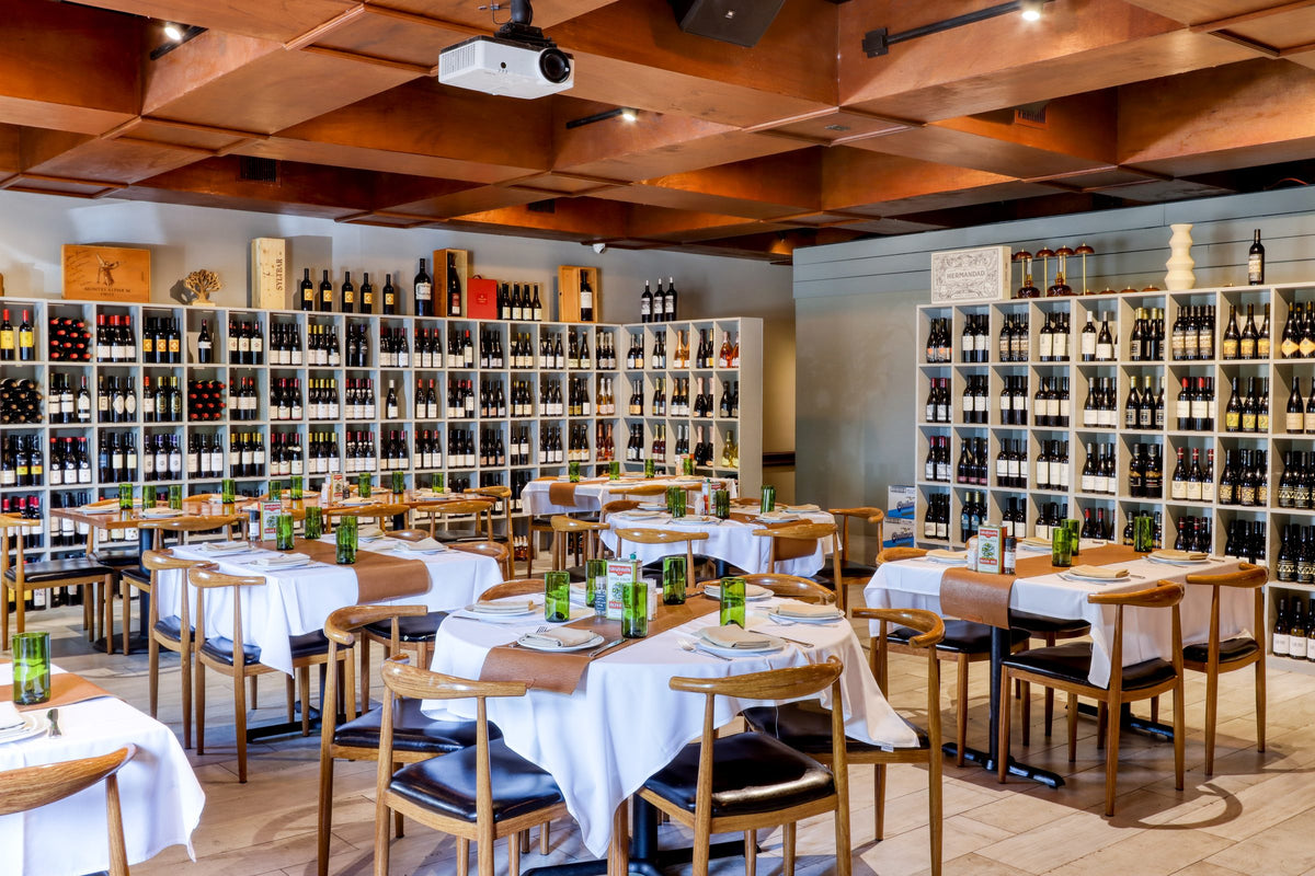 Dining room at Graziano's Restaurant Bird Road with the wine wall