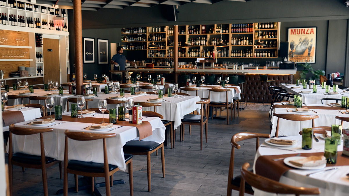 Dining room at Graziano's Coral Gables with the wine wall