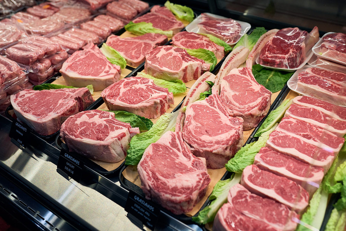 Fresh cut steaks in the butcher case at Graziano's Mercado