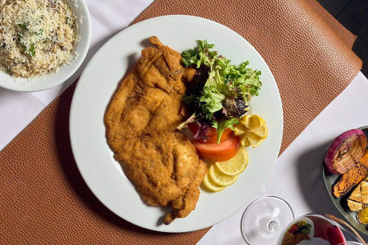 Milanesa with salad at Graziano's