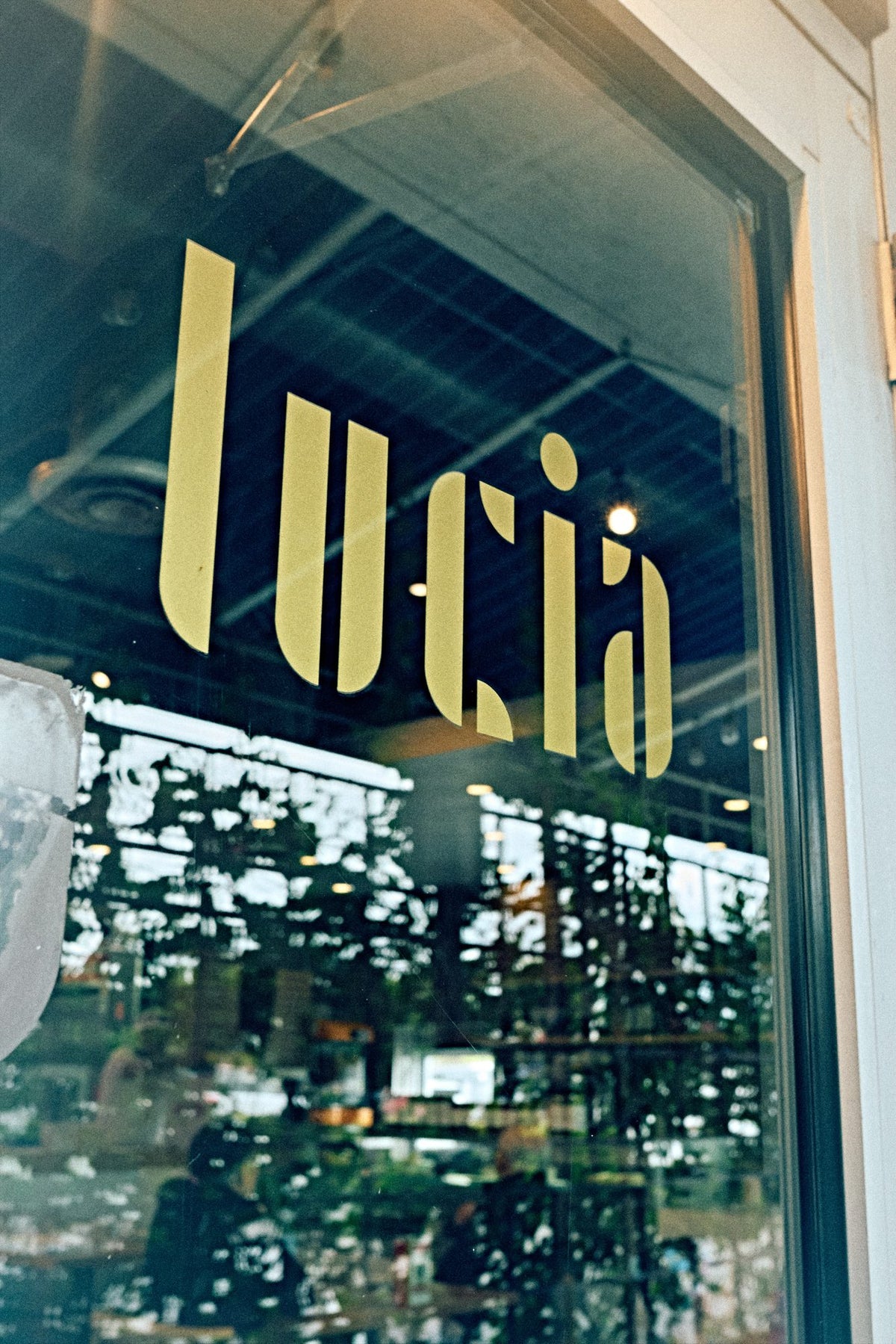 Lucia Pizzeria sign